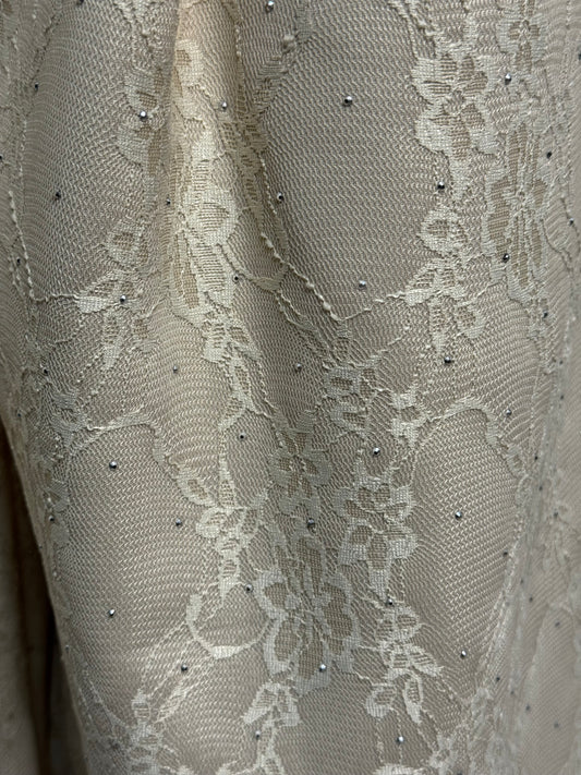 Pantalone pizzo e diamanti
