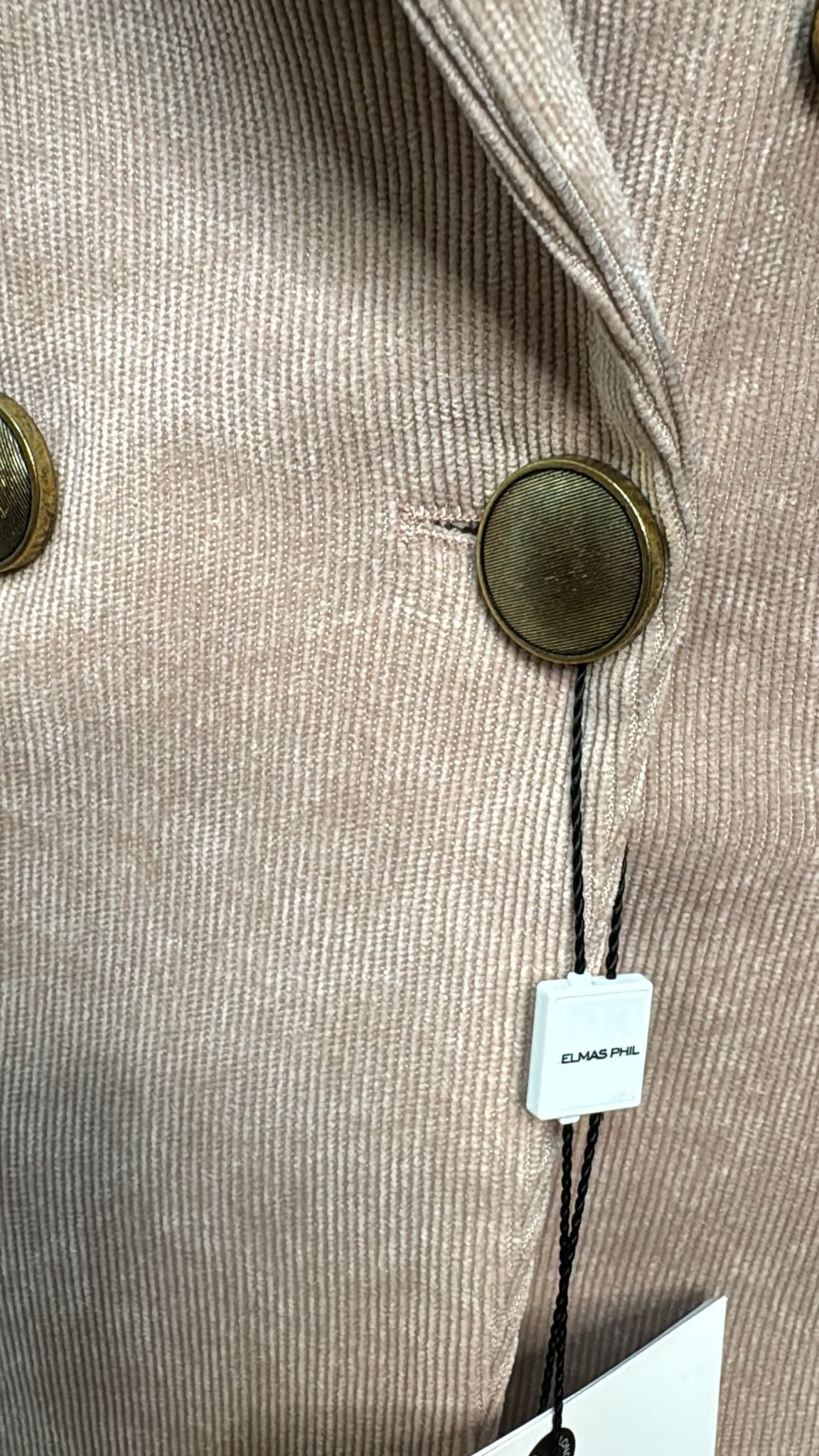 Cappotto in velluto a costine con revers a lancia