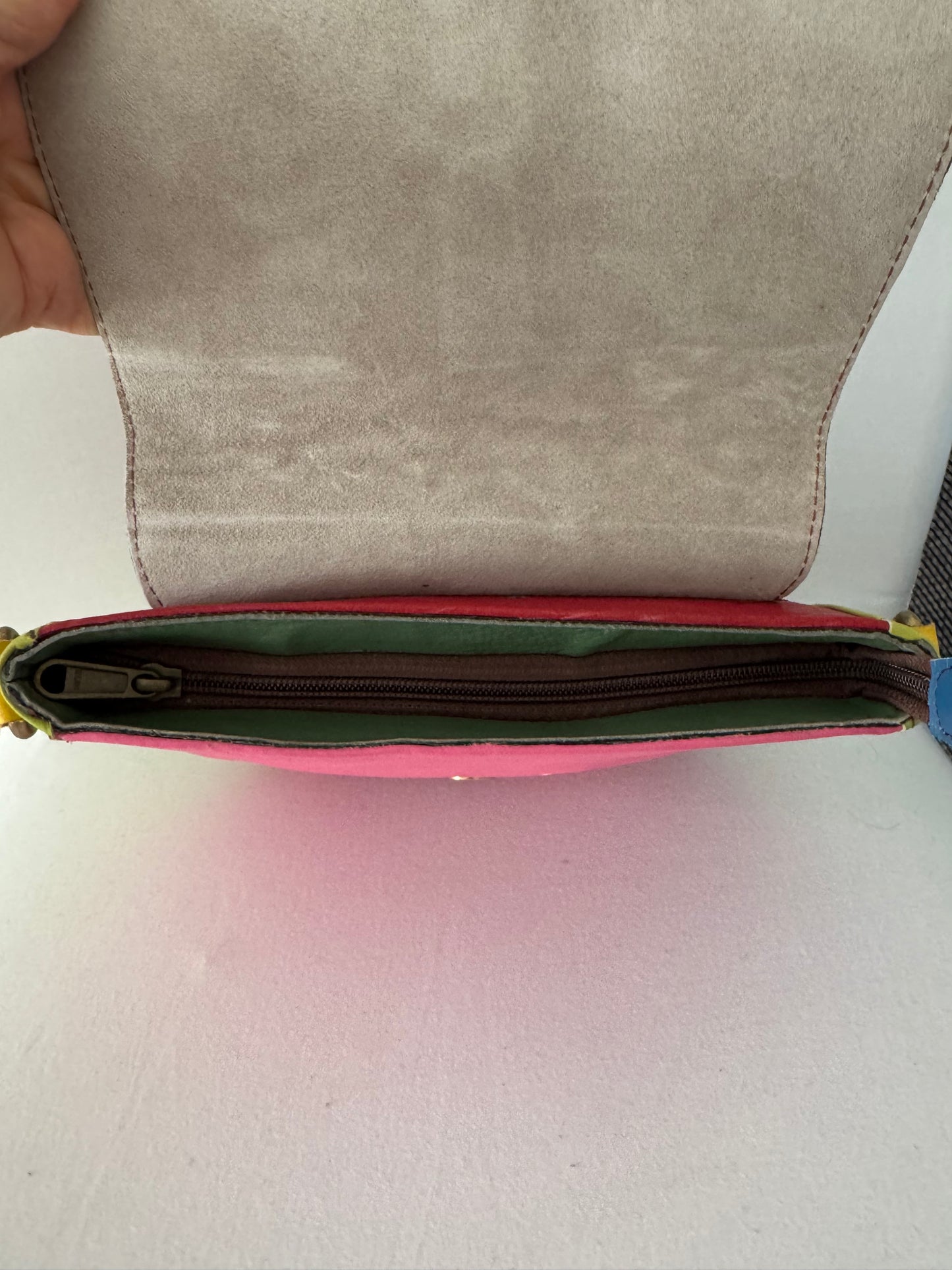 Pochette in pelle e cavallino